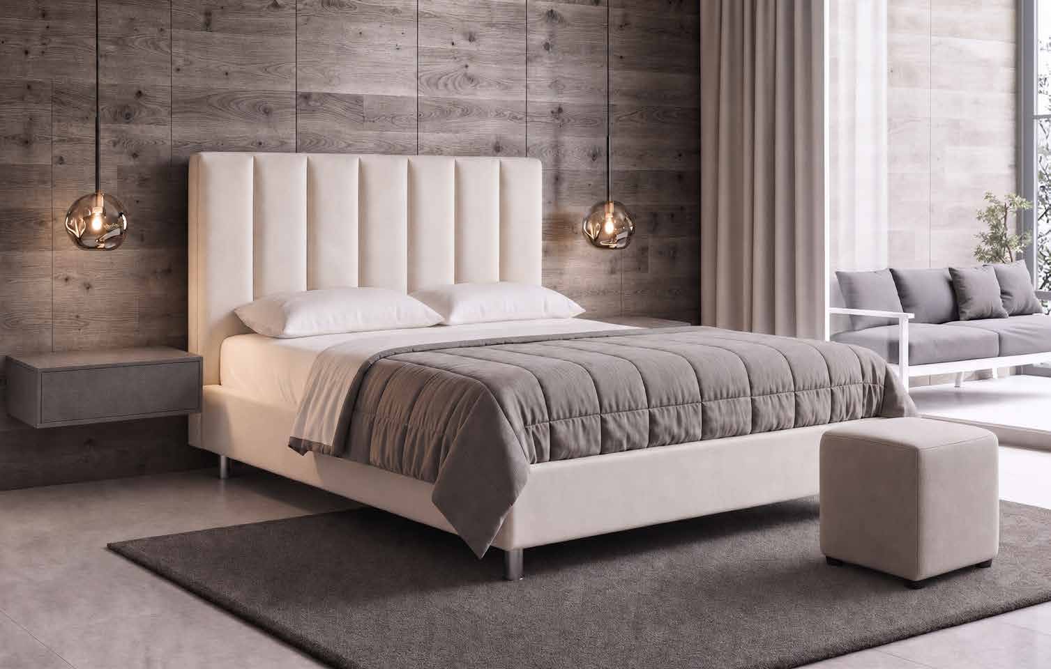 Letto Fresia con testata a pannelli verticali in una camera arredata